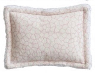 Textured sponge with a crinkled pattern on a white background