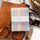 Pastel highlighters muted tones.