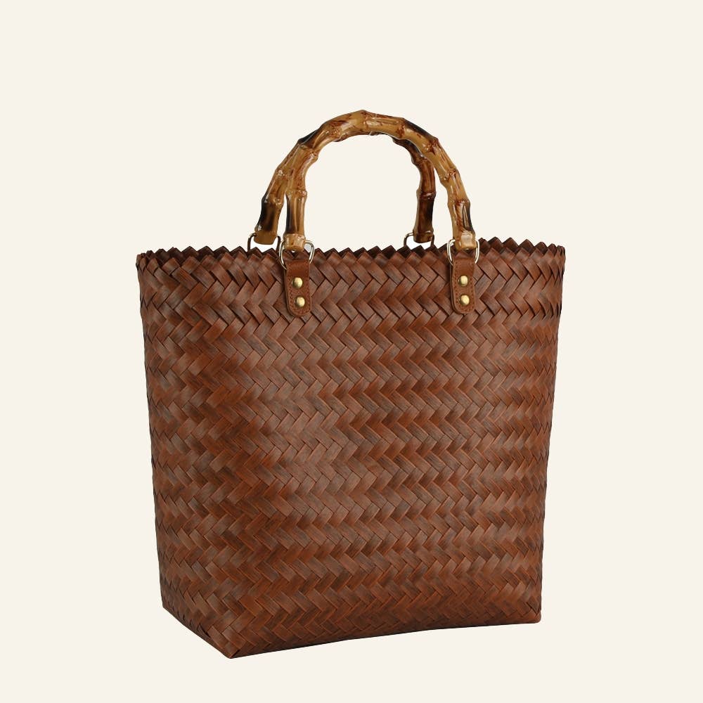 Brown basket weave tote bag with a bamboo handle. Made with 100% paper.