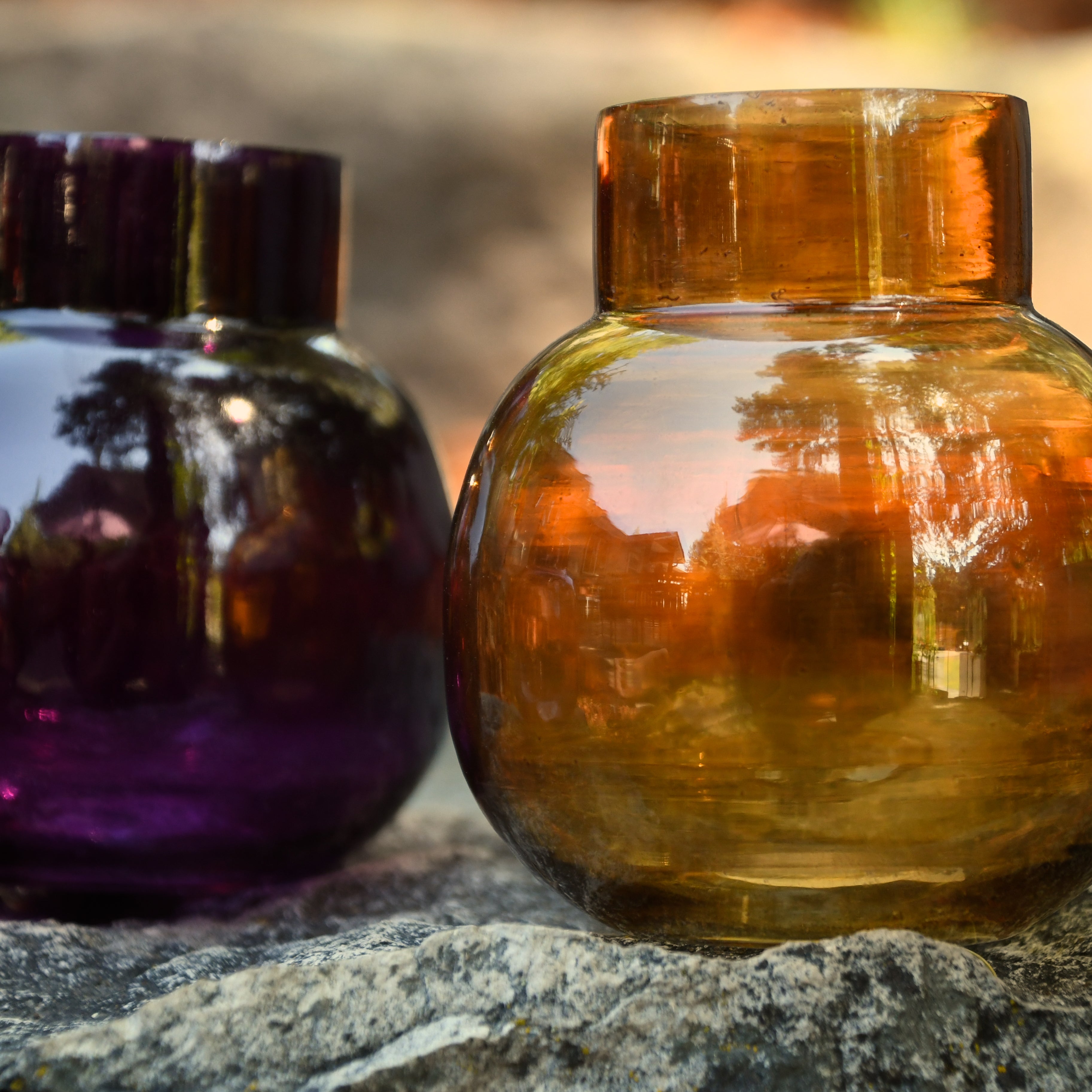 Small glass bud vase. Purple, amber or pink.