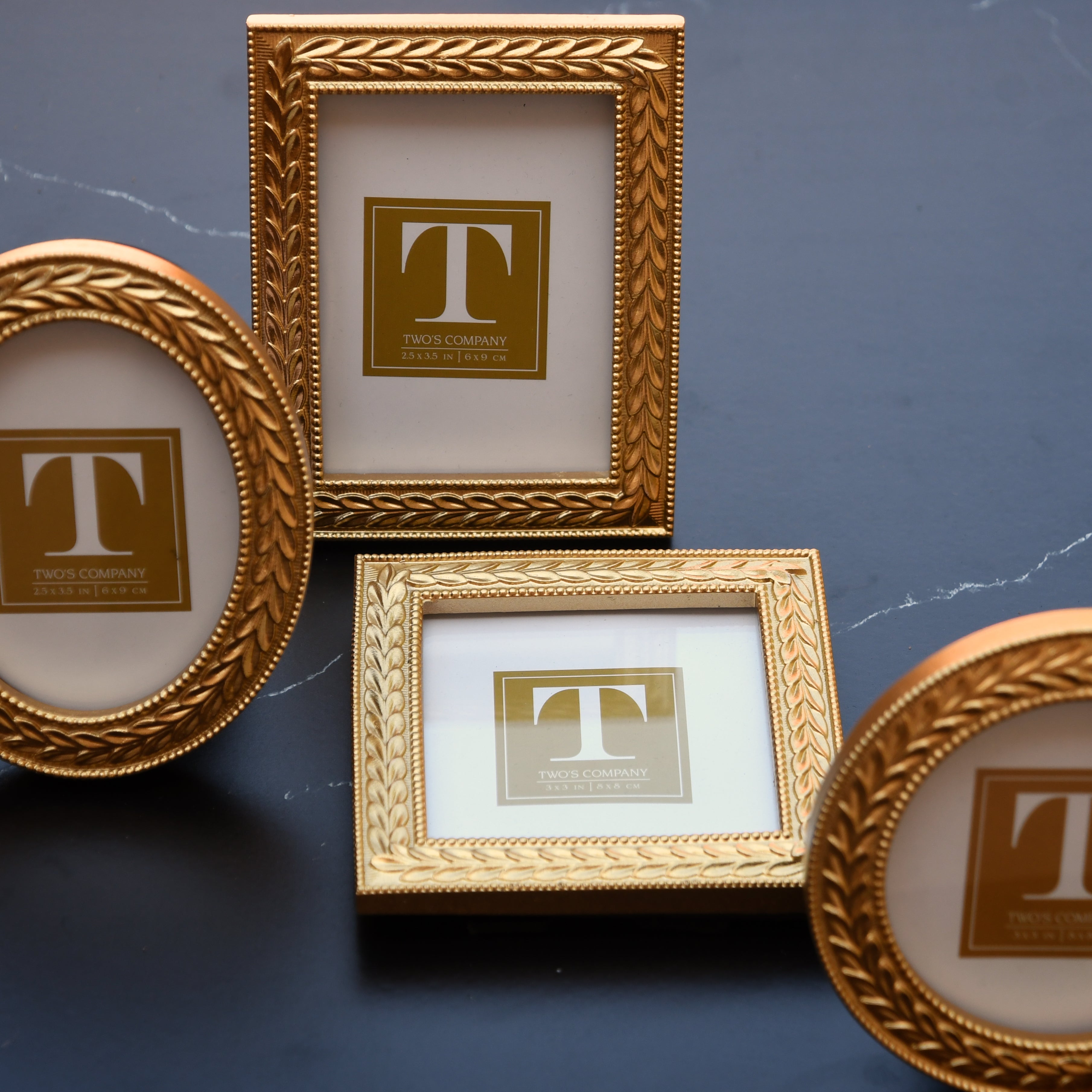 Set of 4 Laurel Wreath photo frames. Small.