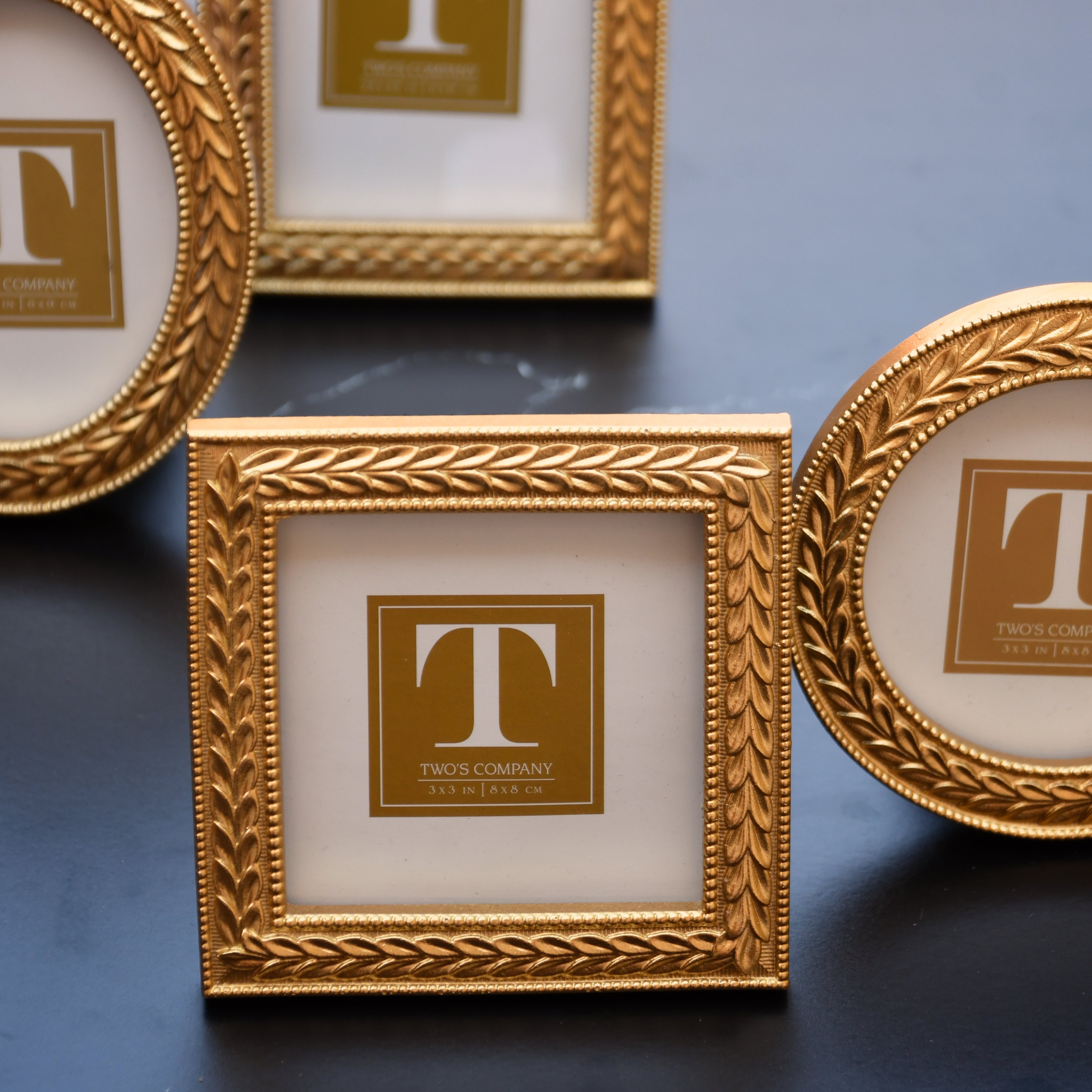 Set of 4 Laurel Wreath photo frames. Small.