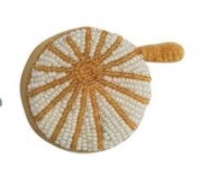 Round woven measure with a sunburst pattern on a white background