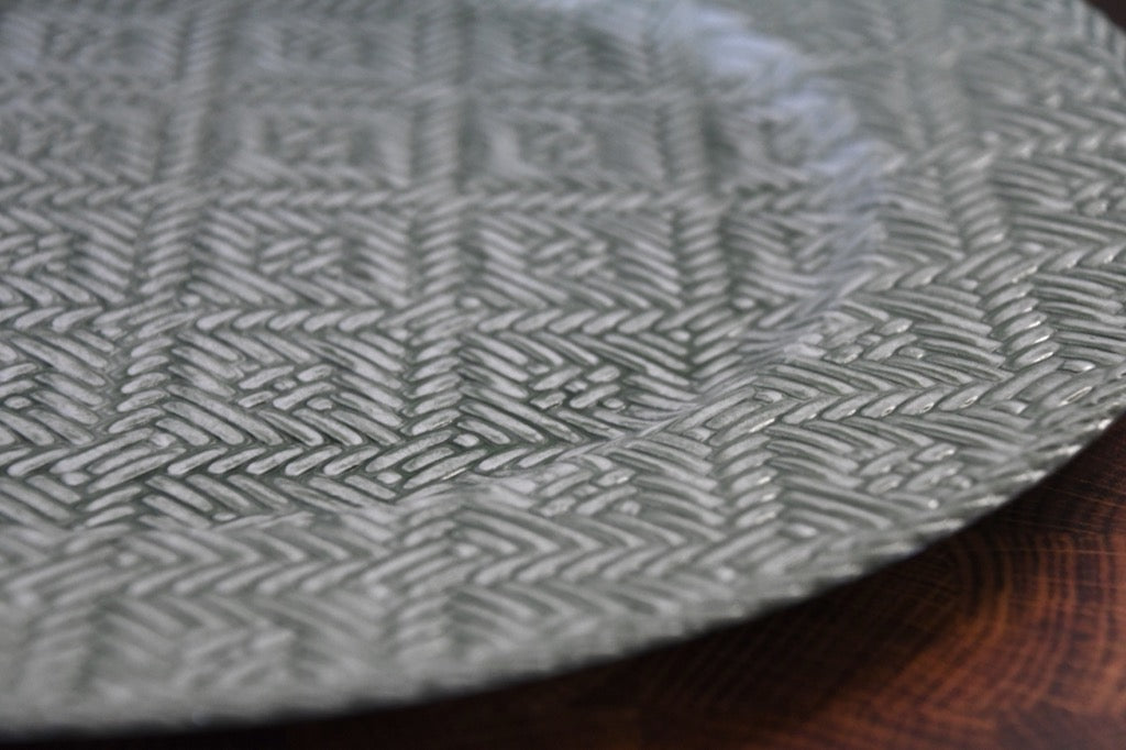 Close-up of a textured metal surface with a pattern