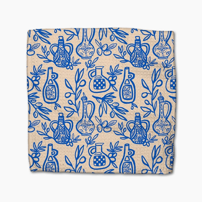 Patterned fabric with blue designs on a beige background