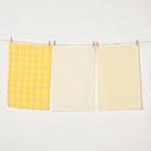 Set of 3 yellow dishtowels. Yellow stripes, Yellow boxes and yellow gingham. 