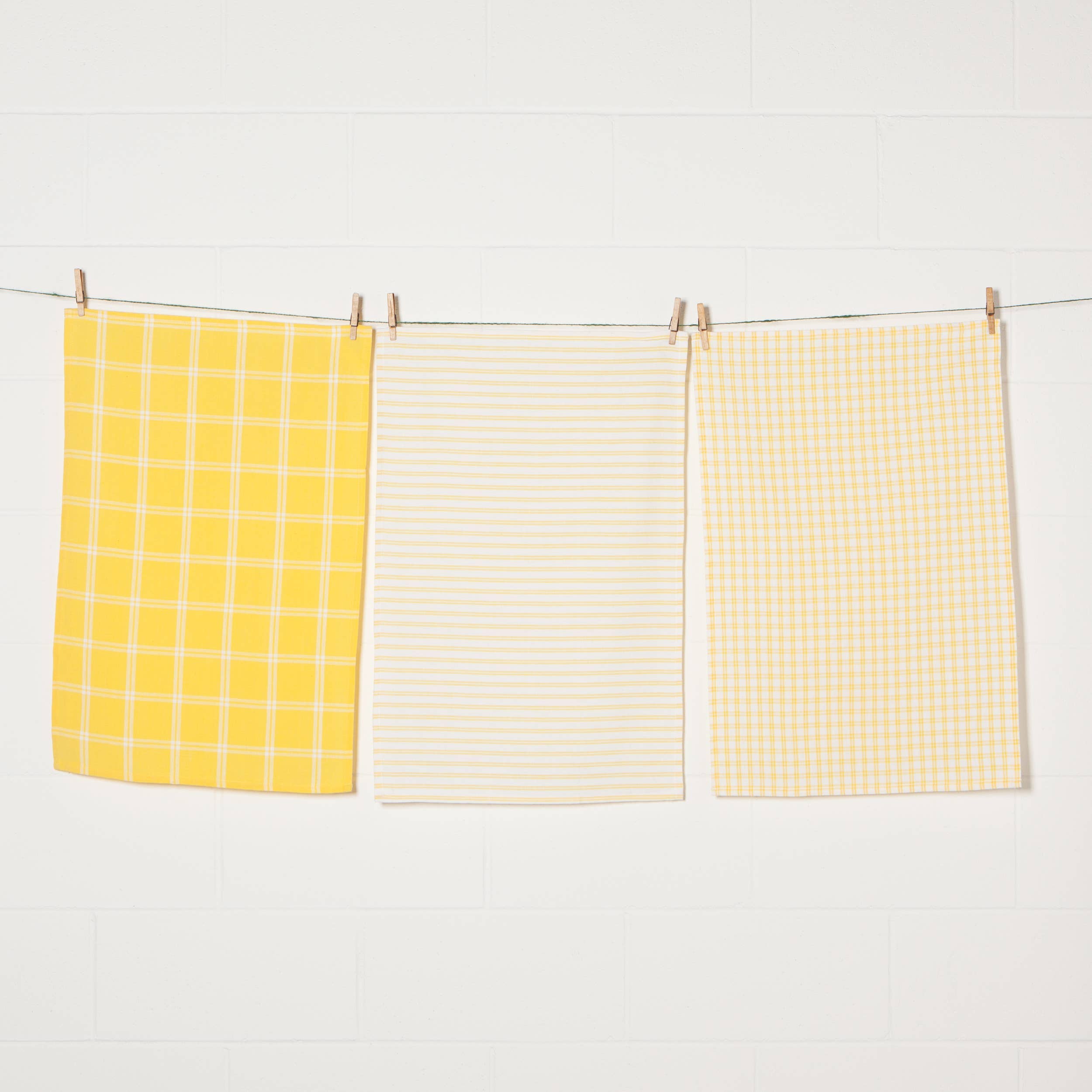 Set of 3 yellow dishtowels. Yellow stripes, Yellow boxes and yellow gingham. 