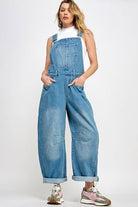 Vintage wash overall with barrell leg, chest pocket and flattering back pockets. Hit at ankle.