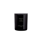 Black candle container with 'Santal & Tonka' text on a white background