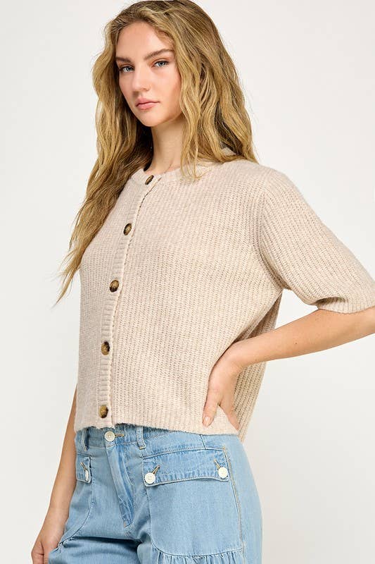Beige button up the front sweater. 1/2 sleeve.