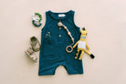 Toddler baby romber in navy blue with front pockets and buttons