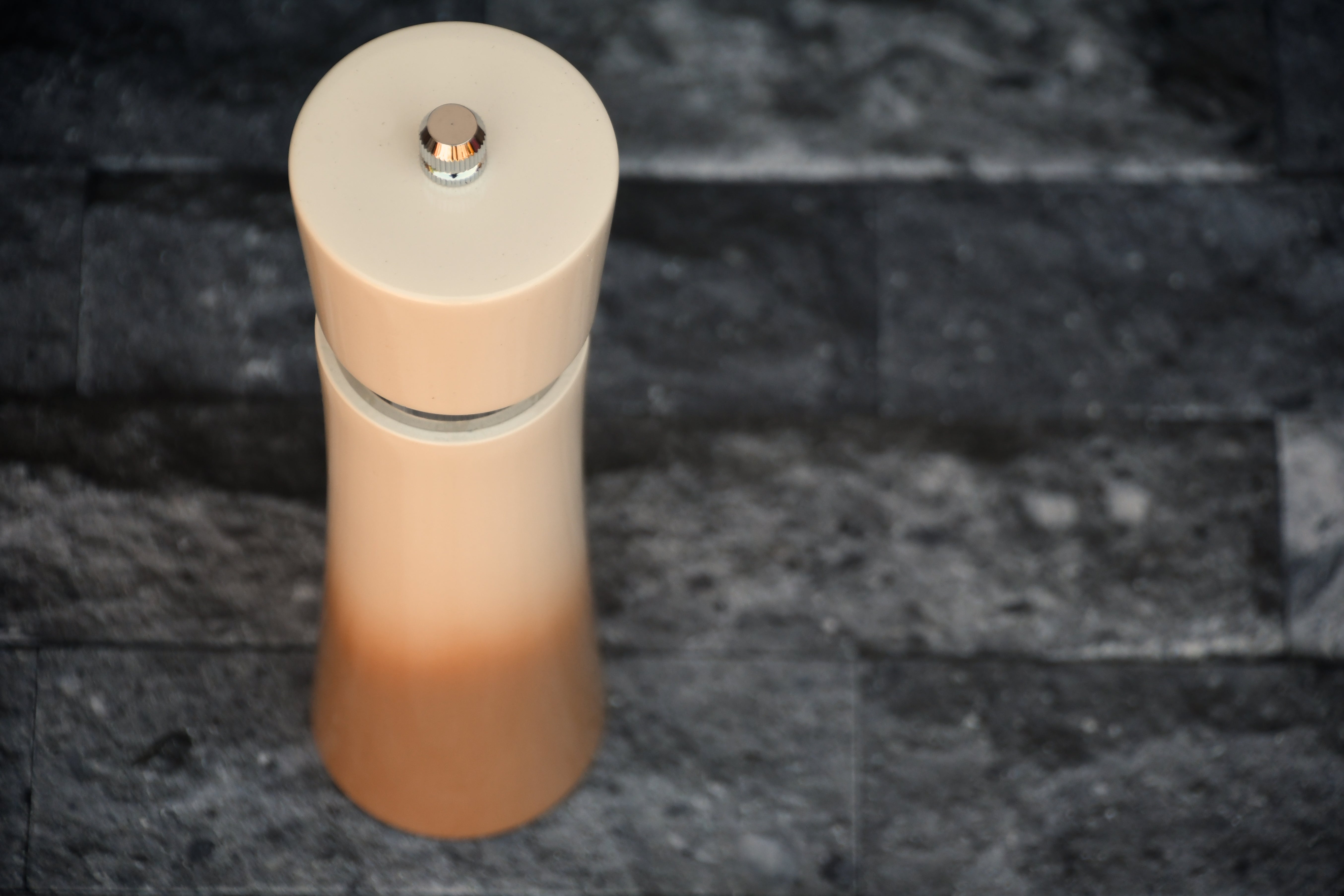 Tan and beige ombre salt and pepper mill.