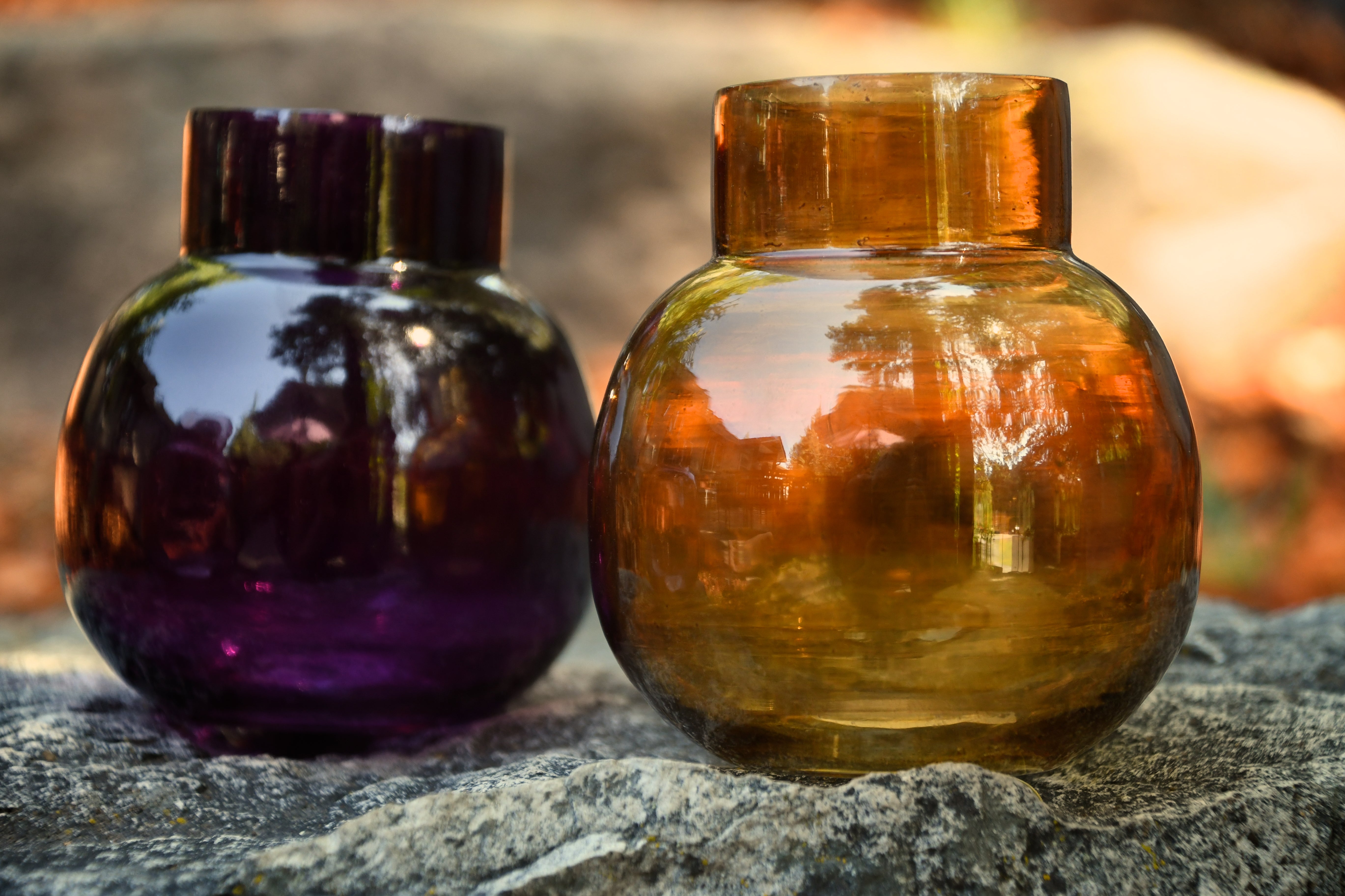 Small glass bud vase. Purple, amber or pink.