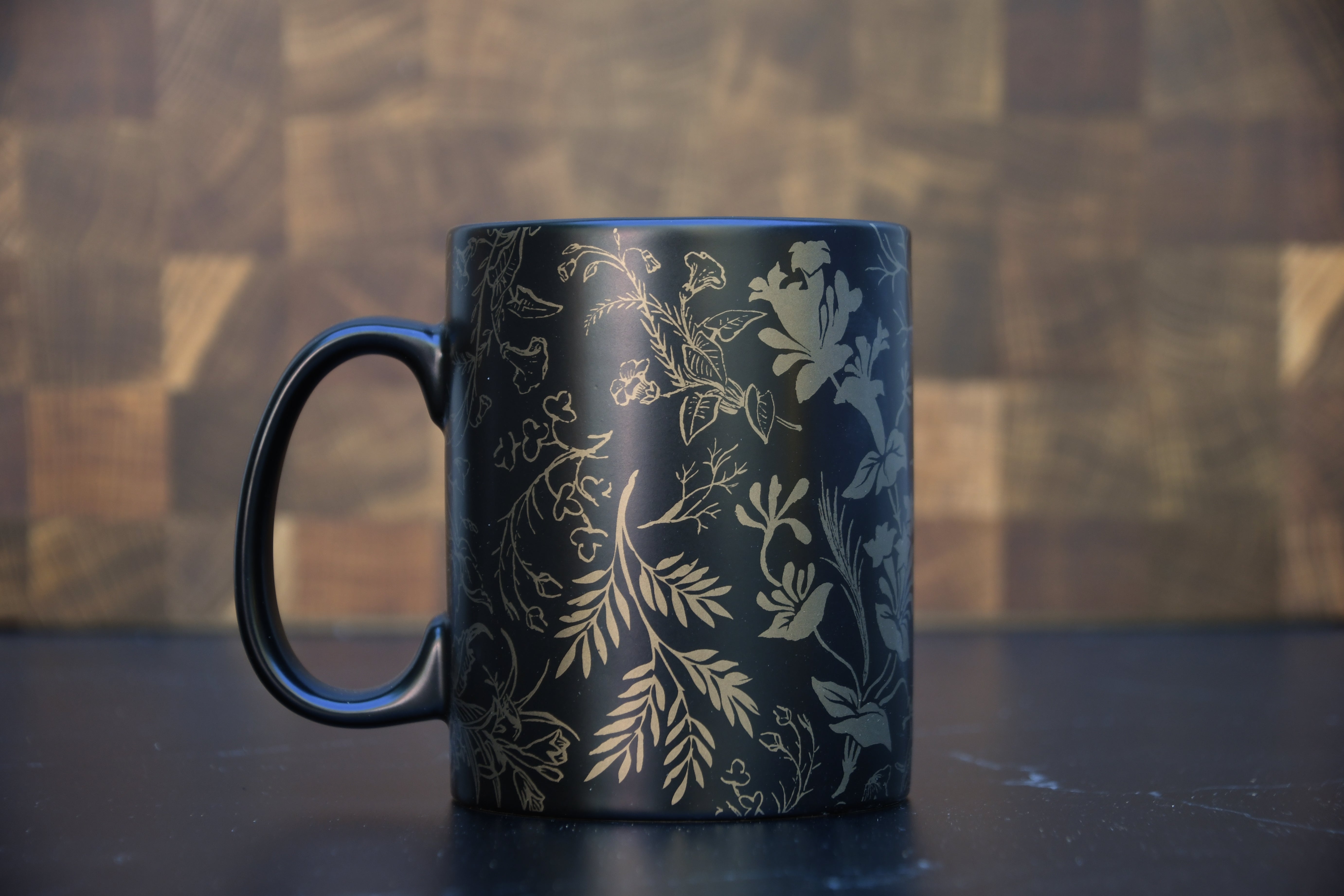Black and Gold Coffee Mug. Gold Florals on black coffee mug.