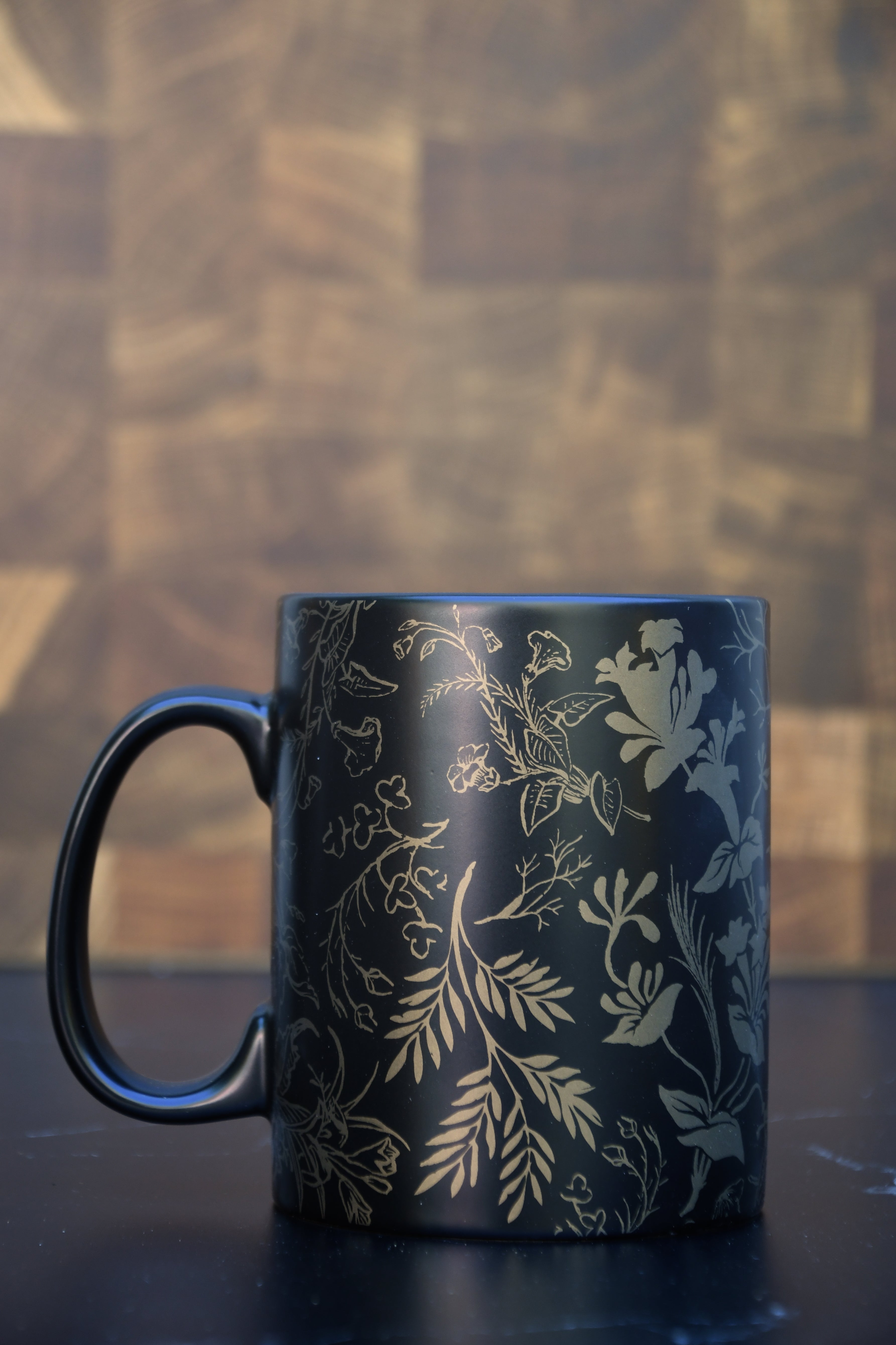 Black and Gold Coffee Mug. Gold Florals on black coffee mug.