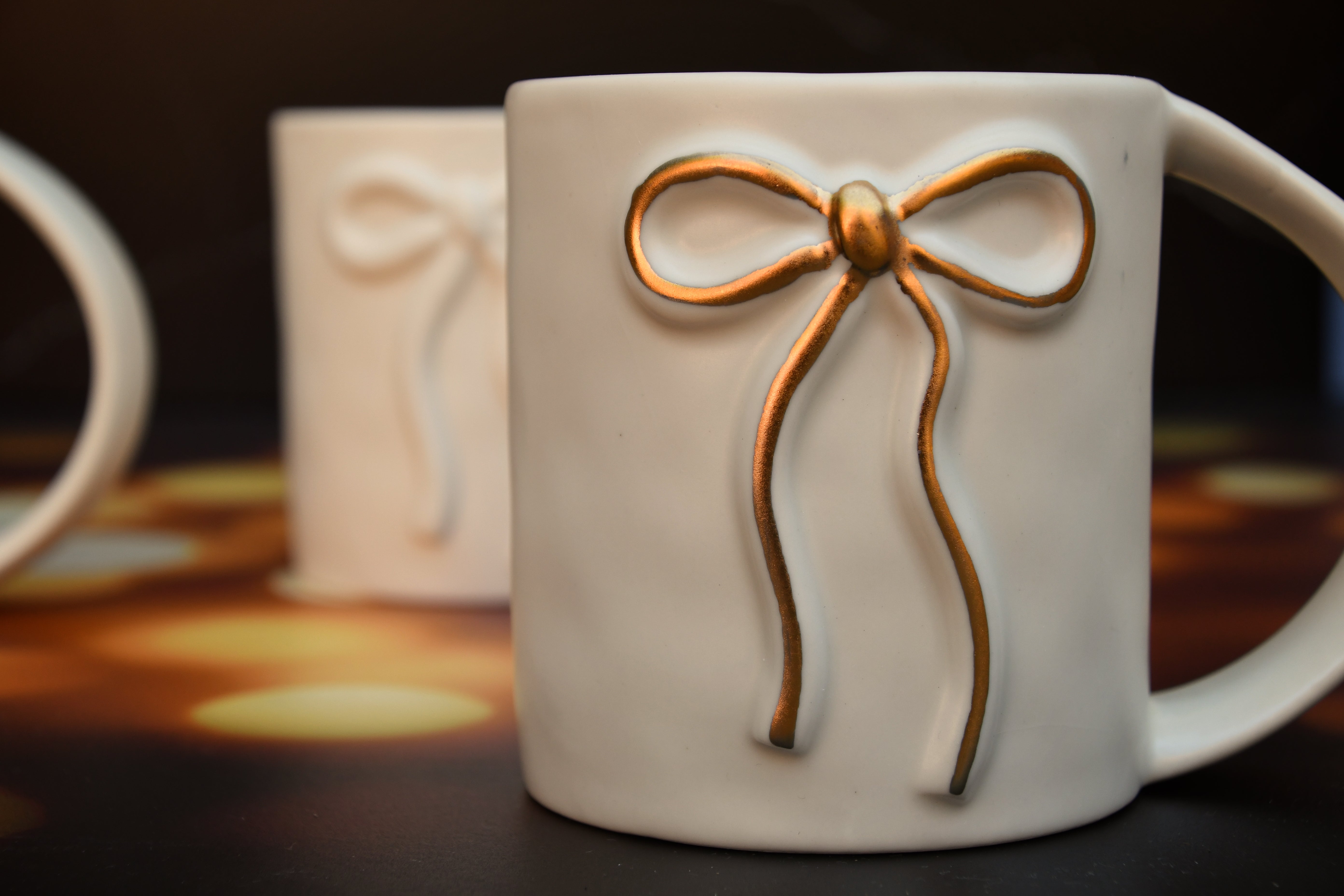 Ceramic Mug with raised Gold Bow