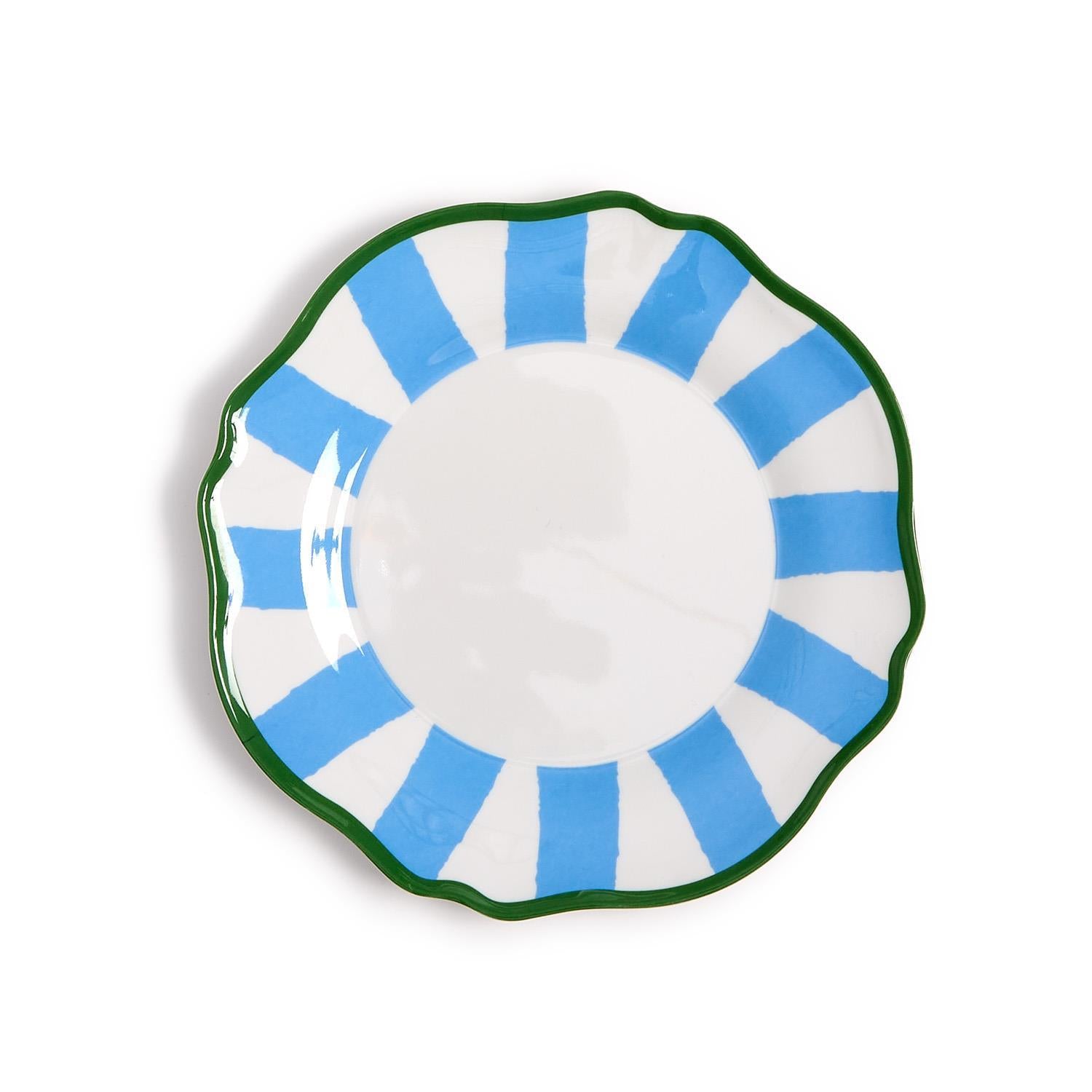 Decorative plate with blue and green design on a white background