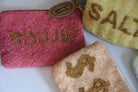 Three beaded pouches with 'BOUJIE' and 'SALD' text on a white background