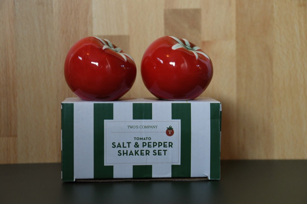 Tomato-shaped salt and pepper shakers on a box with 'Two's Company' branding.