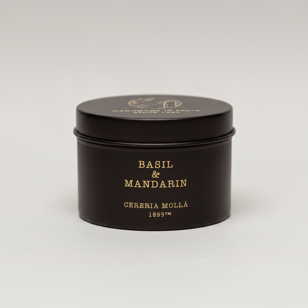 Black tin container with gold text on a white background