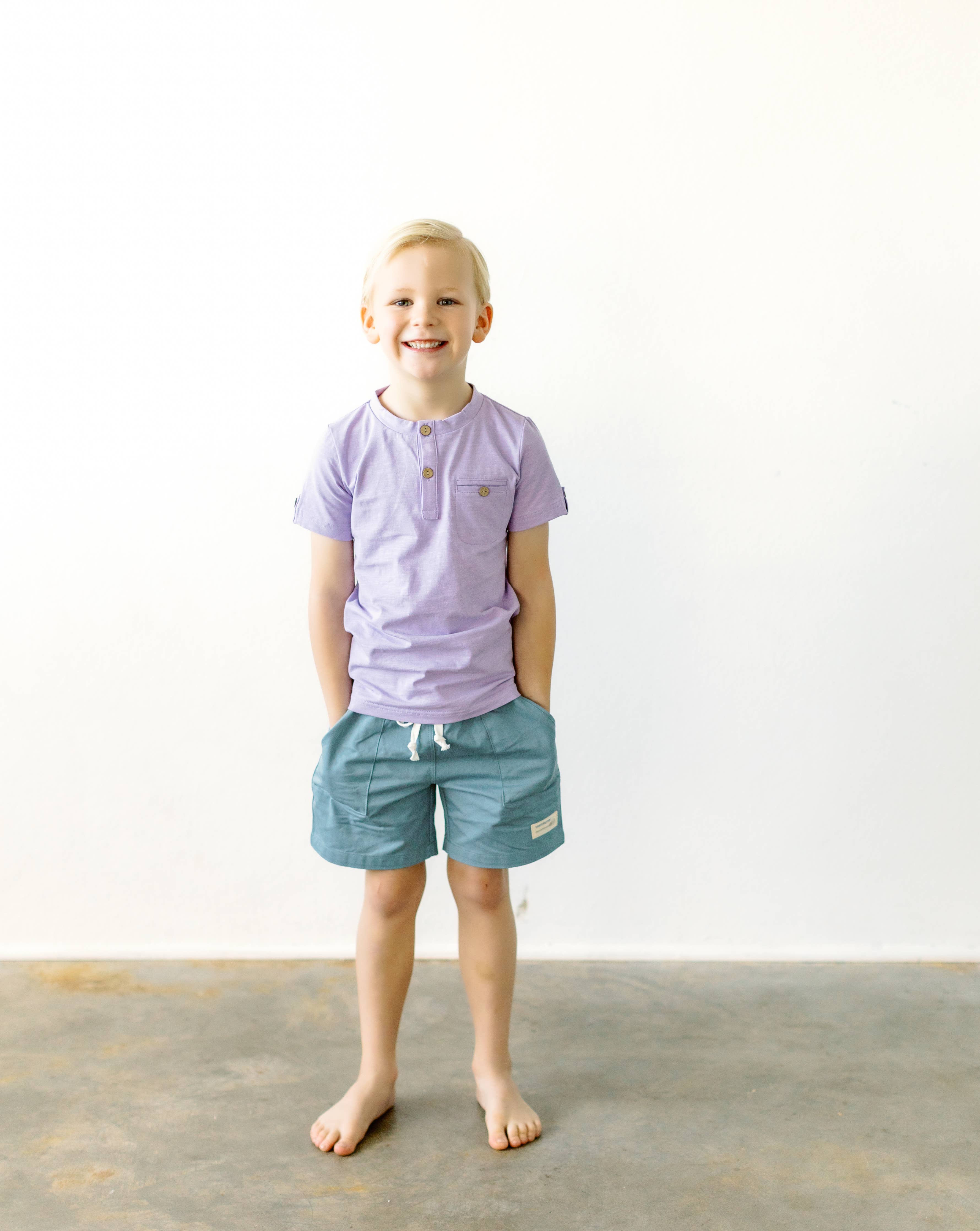 Boys Sawyer and Finn shorts in dusty teal. Front pockets and drawstring.
