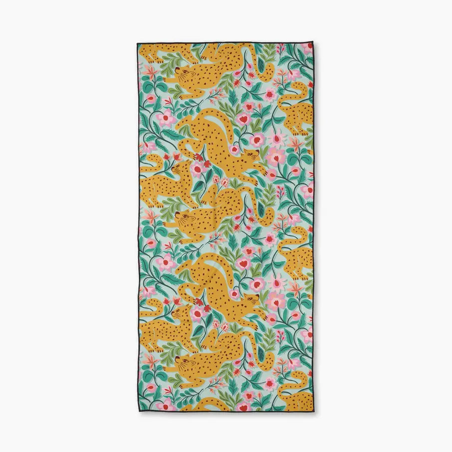Towel with yellow leopards and floral pattern on a white background