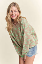 Beige sweater with mint flower dots. 