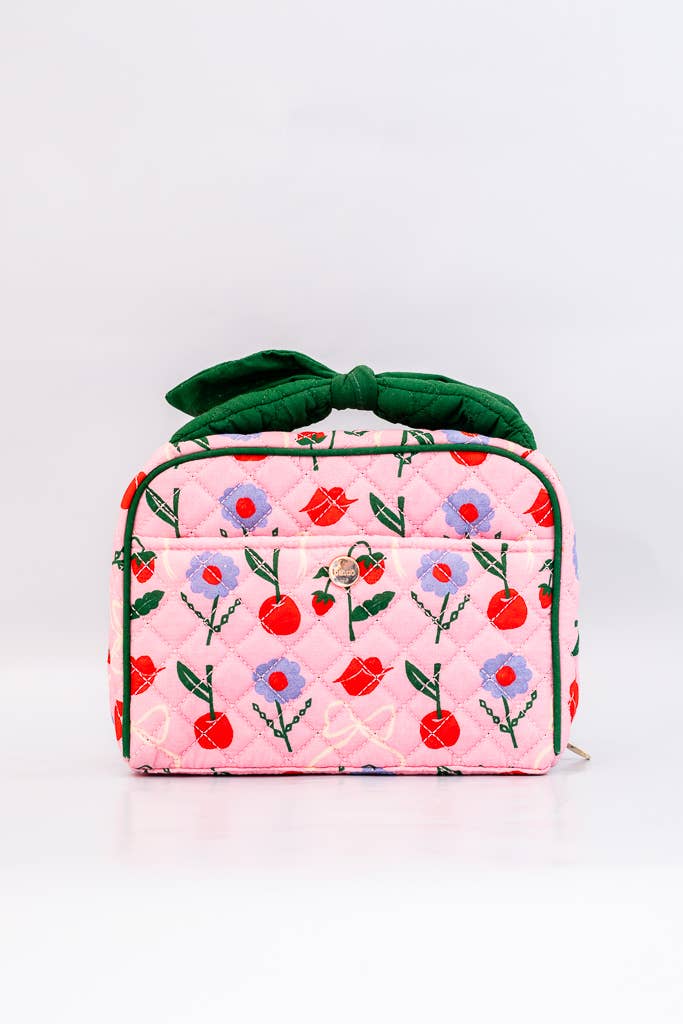 Travel tote with floral, cherry and lip print. 