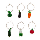 Set of six wine glass charms shaped like vegetables on a white background